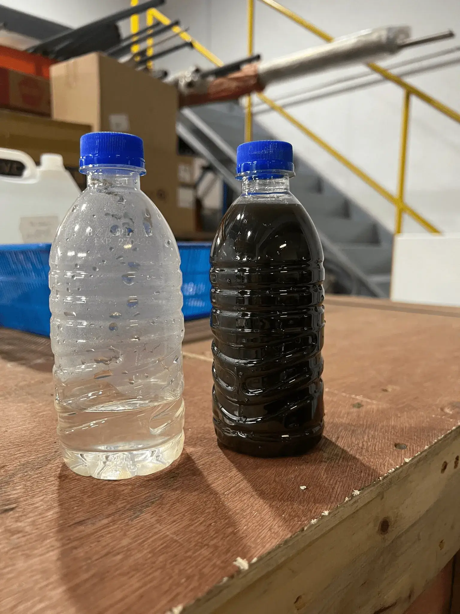 Side-by-side comparison of treated and untreated palm oil wastewater